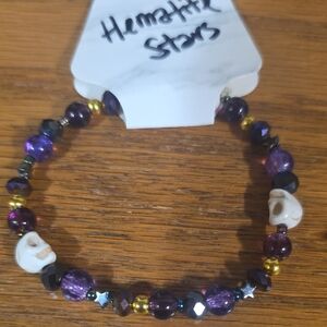Purple and Gold Beaded Bracelet with Skull Accents